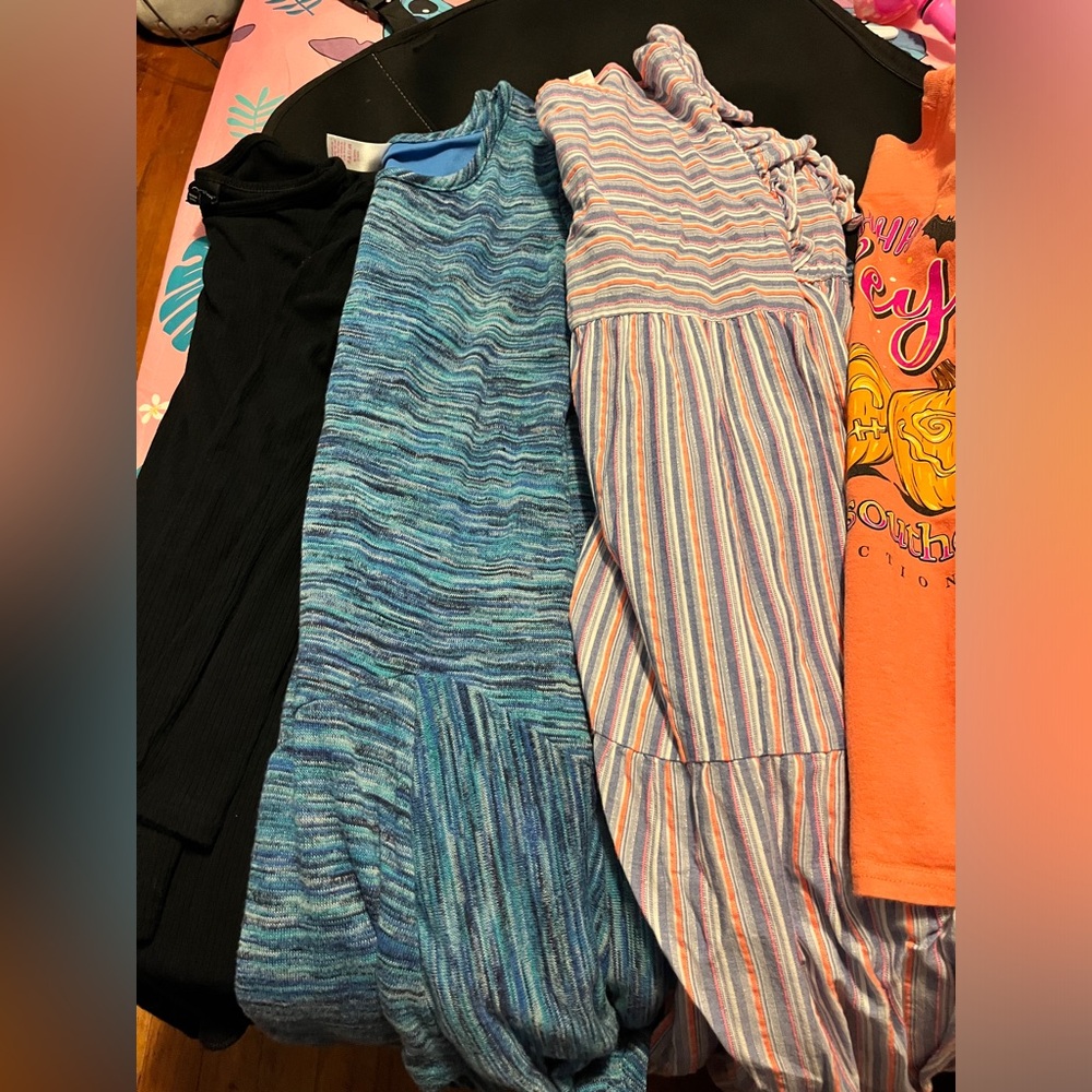 Girls size 10/12 clothing. 3 dresses